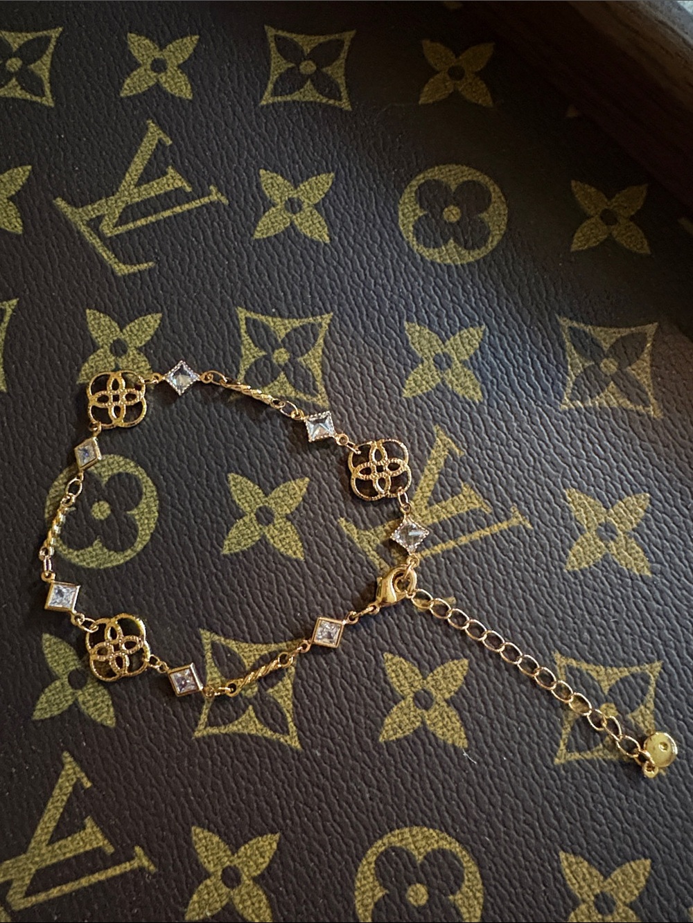 Delicate Gold Tone Floral Link Bracelet with Clear Stones